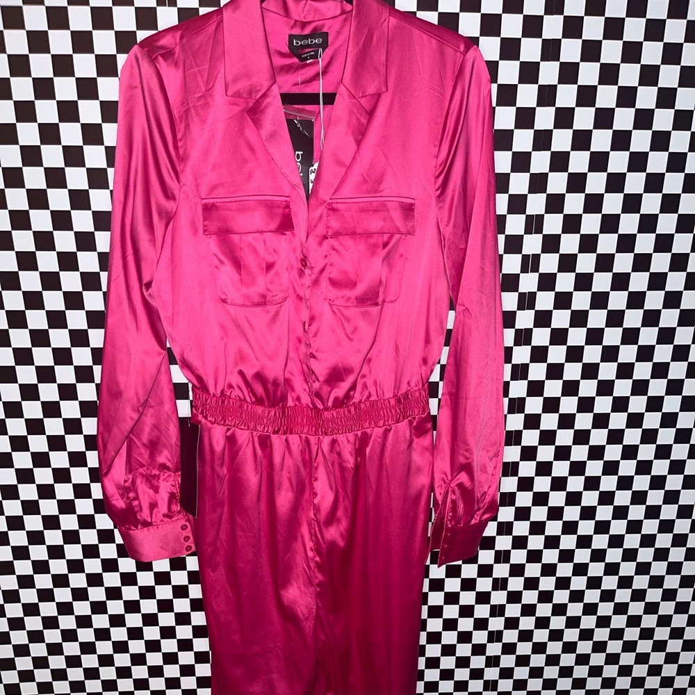 Super sexy jumpsuit by BEBE! NWT This  piece is fierce! Dress it up or down!